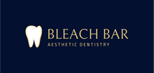 Load image into Gallery viewer, Bleach Bar logo. Dark blue background with sand colored writing and a white tooth. aesthetic dentistry 
